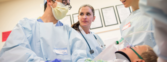 medical staff with child patient